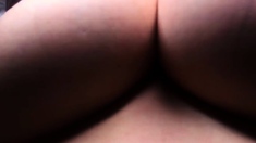 Busty curly brunette with big boobs fucks on couch