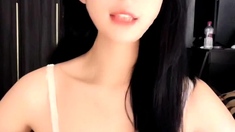 Naughty Japanese babe Ayaka Tomoda masturbates