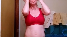 Redheaded amateur MILF with a sex toy on webcam show