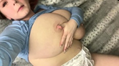 Busty Babe Playing With Her Big Boobs